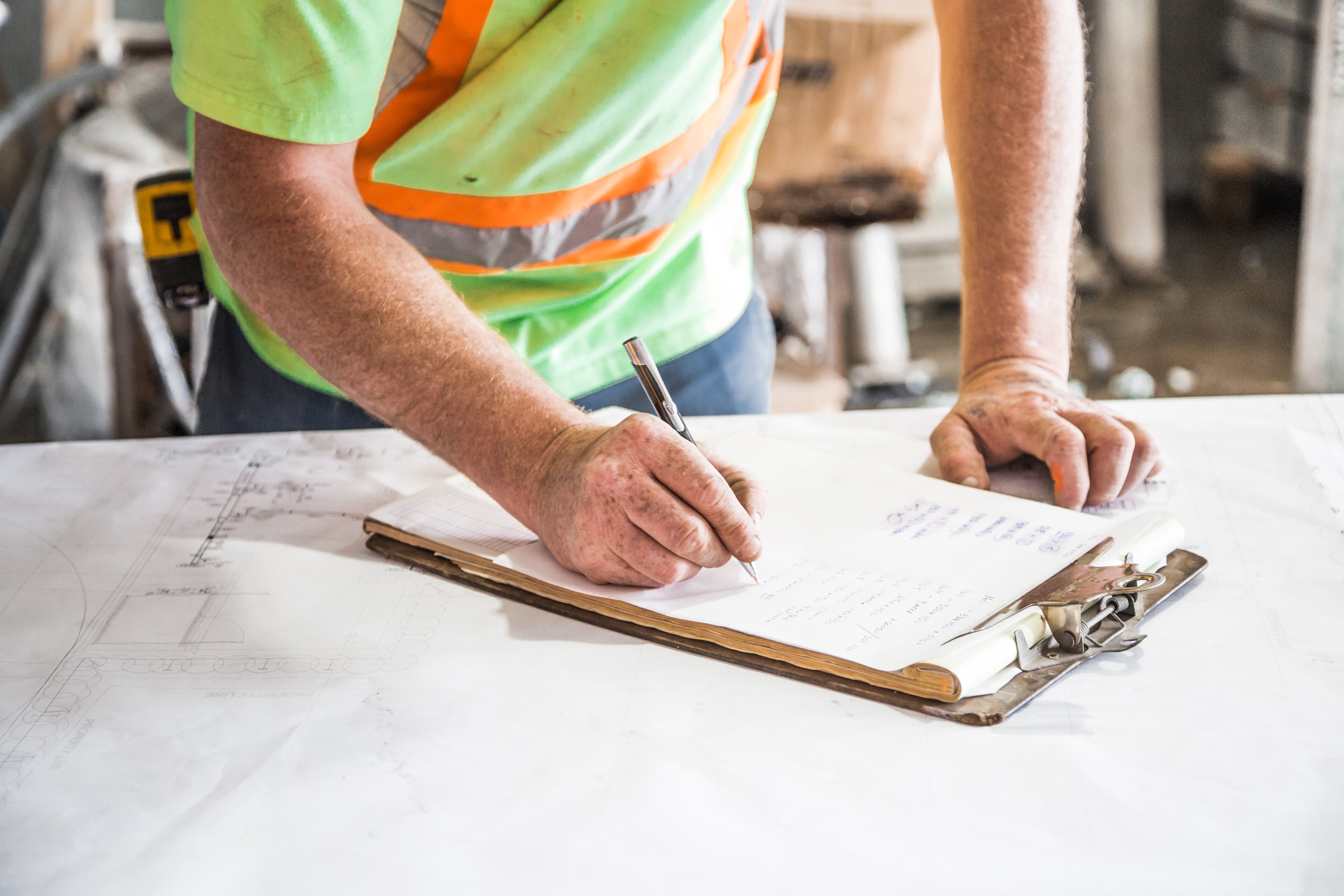 Industrial worker reviewing order